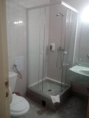 Фото номера Трехместный номер Отель Hotel Panoramic г. Рымнику-Вылча 11