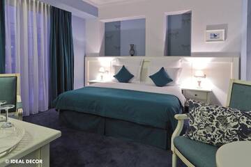 Фото номера Двухместный номер Делюкс с 1 кроватью Отель Simfonia Boutique Hotel г. Рымнику-Вылча 13
