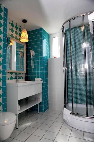 Фото номера Двухместный номер Делюкс с 1 кроватью Отель Simfonia Boutique Hotel г. Рымнику-Вылча 11