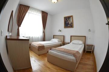 Фото номера Двухместный номер с 1 кроватью или 2 отдельными кроватями Отель Hotel Posada г. Рымнику-Вылча 19