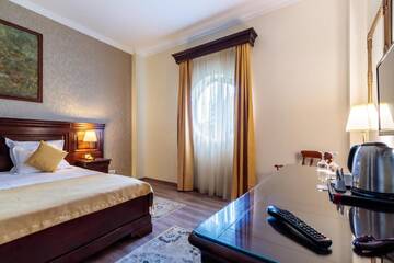 Фото номера Семейные апартаменты Отель Grand Hotel Sofianu г. Рымнику-Вылча 2